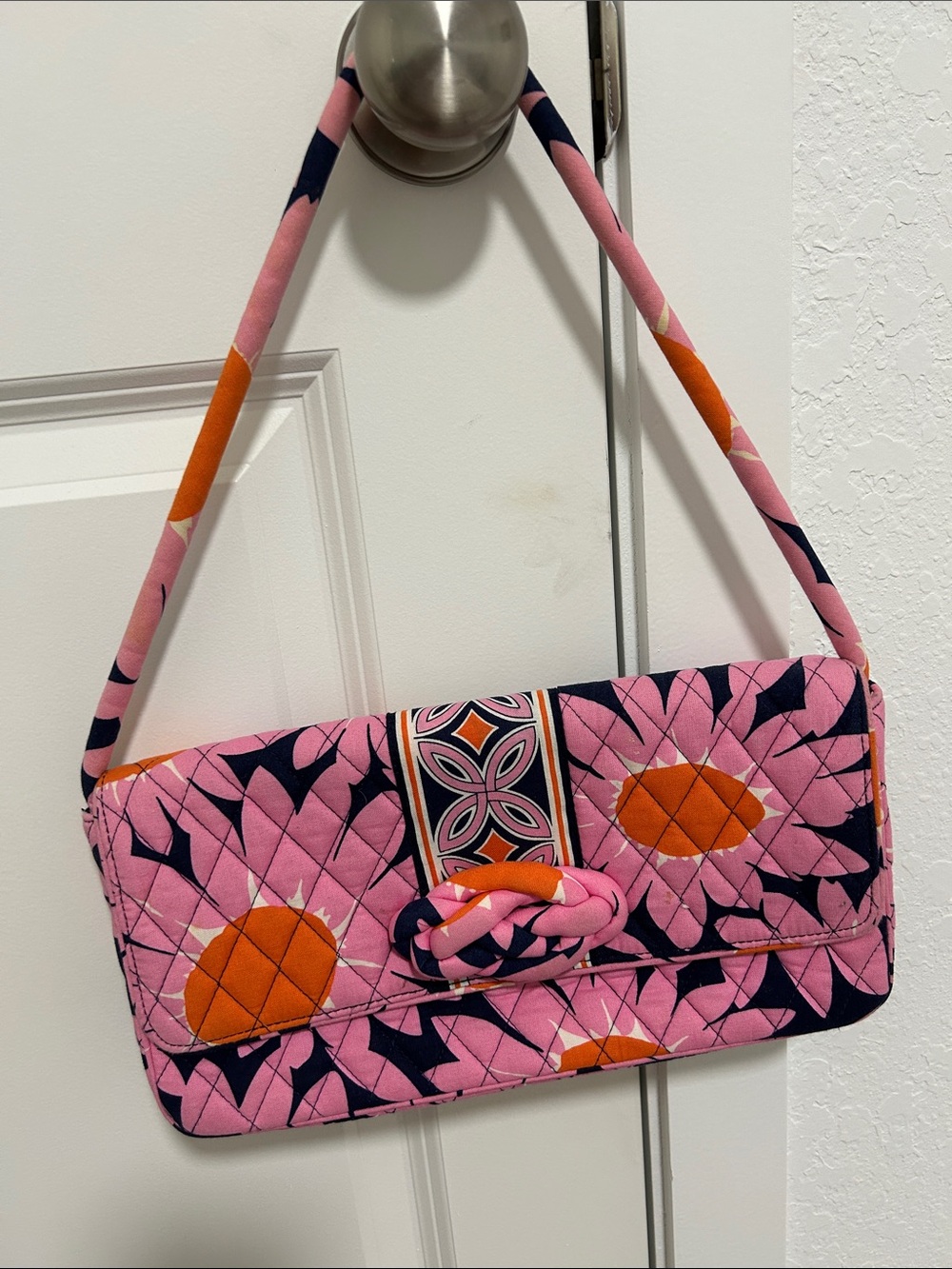 Vera Bradley Pink Floral Quilted Shoulder Bag with Orange Accents.